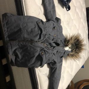 This is a grey jacket that is for winter